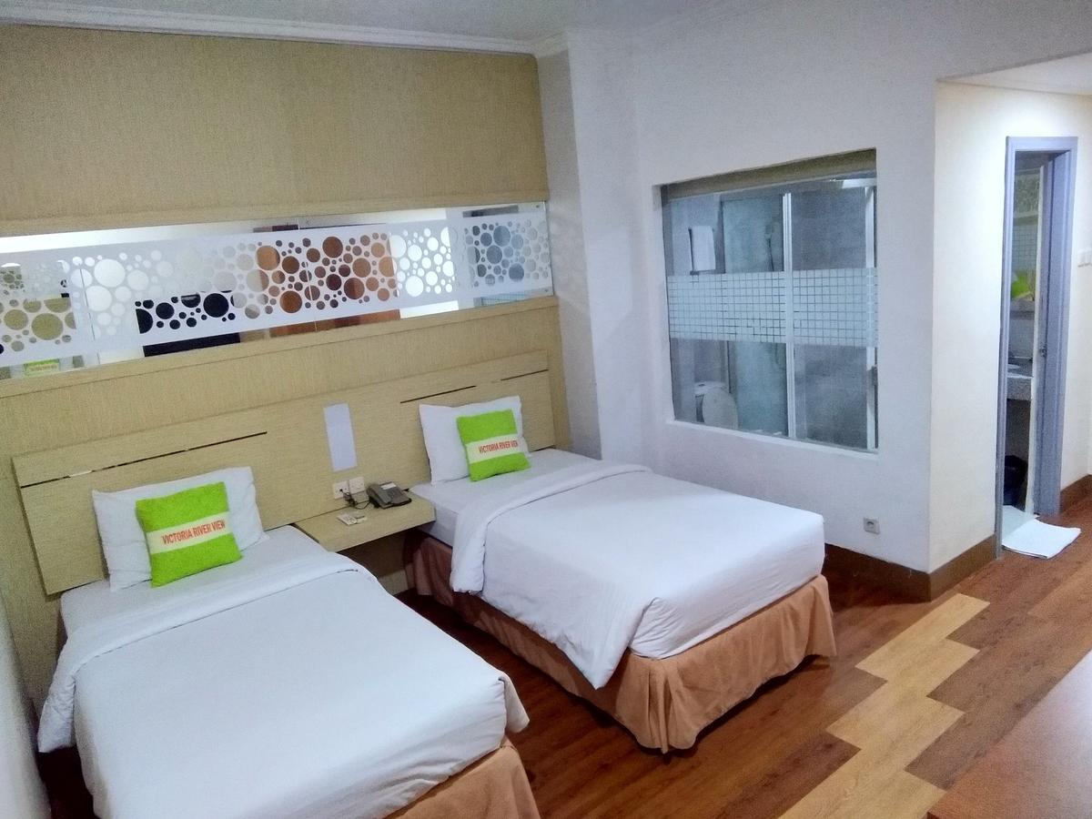 Hotel Victoria River View Banjarmasin  Exteriör bild