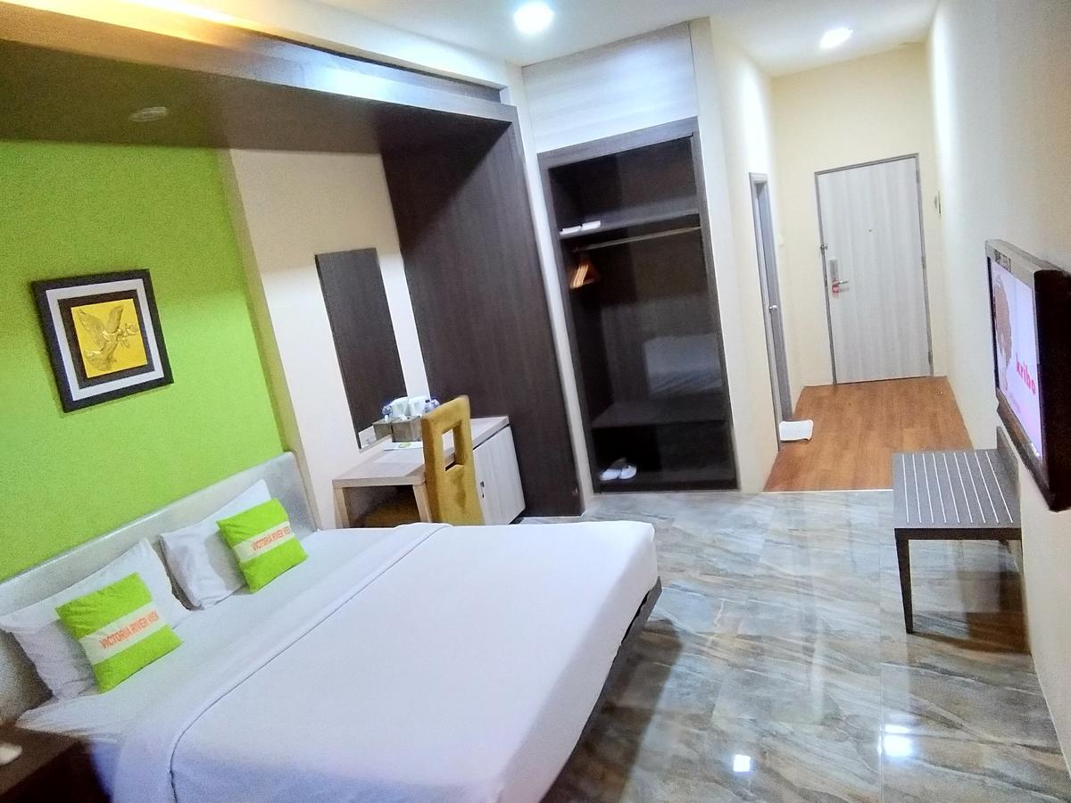 Hotel Victoria River View Banjarmasin  Exteriör bild